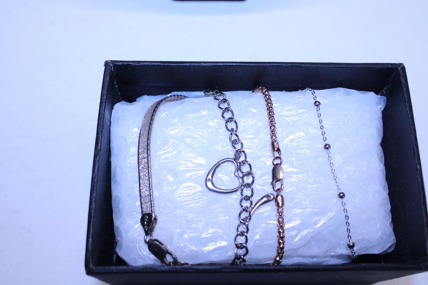 Four sterling silver and gold plate bracelets