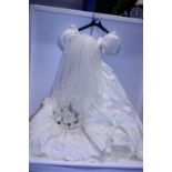 A wedding dress with veil etc