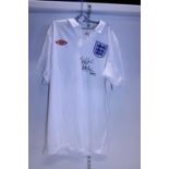 A England Football T-shirt signed by Peter Shilton