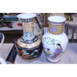A pair of Oriental themed vases