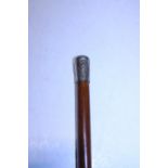A military themed swagger stick, shipping unavailable