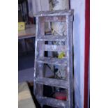 A pair of vintage wooden step ladders, shipping unavailable
