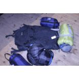 A job lot of sleeping bags & large ruck sack
