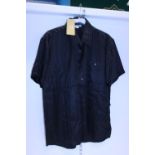 A new with tags silk shirt size M