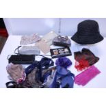 A box full of ladies clothing accessories and mens ties