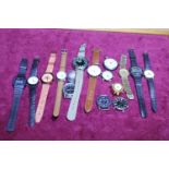 A box of assorted watches and time pieces