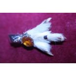 A vintage Grouse foot brooch