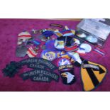 A job lot of military related patches and other items