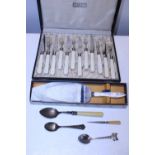A selection of assorted vintage cutlery