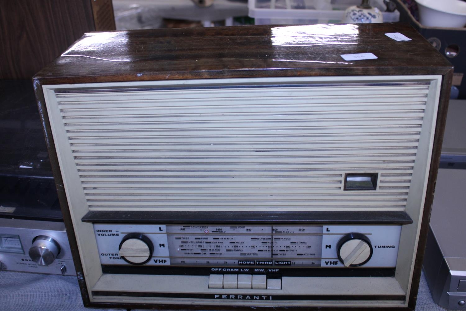 A vintage Ferranti wooden cased radio. Postage unavailable