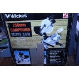 A boxed compound mitre saw (untested) Postage unavailable