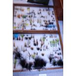 A box of hand tied fly fishing flies