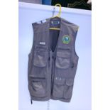 A Champion fishing utility vest size M
