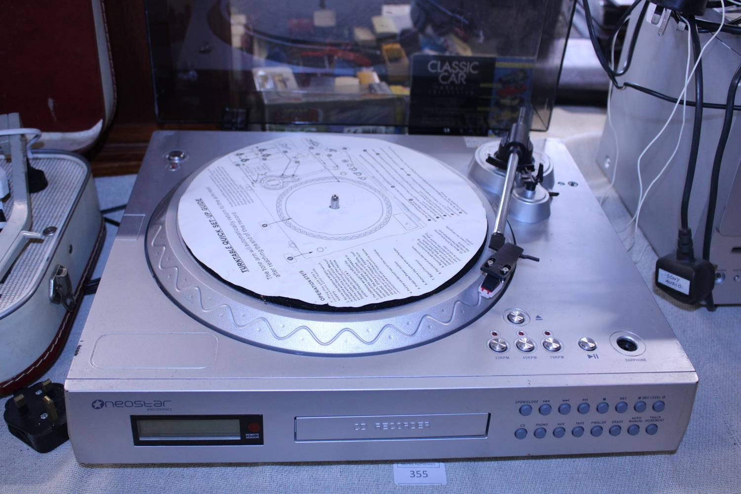 A Neostar turntable and CD recorder. Postage unavailable