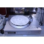 A Neostar turntable and CD recorder. Postage unavailable