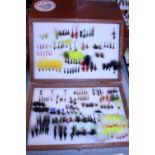 A box of hand tied fly fishing flies
