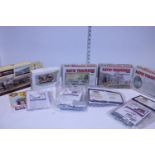 A box of assorted railway model accessories