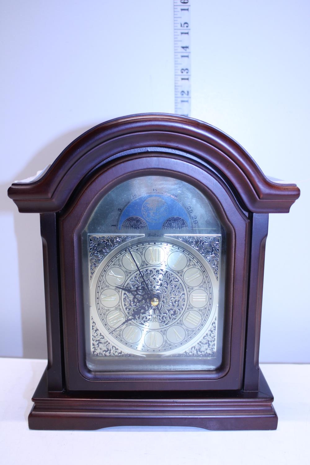 A Bentima battery powered mantel clock