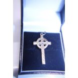 A tests for 9CT gold Celtic cross pendant 4.17 Grams