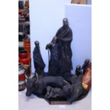 Soul Journey figures on a presentation plinth entitled The Gift. Largest is 50cm tall.