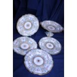 Four Victorian plates and a Victorian cake stand in bone China possibly Minton?