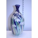 A Moorcroft style trial vase by L B Moorcroft signed and dated for 1999. 28cm tall.