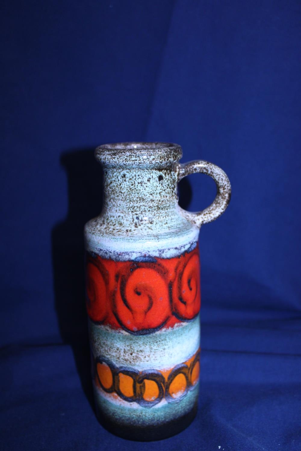 A West German art pottery vase. 21cm tall.