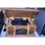 A vintage style record and CD player. Shipping unavailable