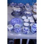 A large selection of vintage blue and white ceramics including Johnson Brothers, Churchill and