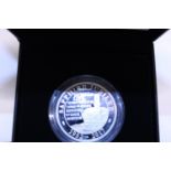 A boxed 2017 £5 silver proof coin