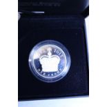 A boxed 2015 silver proof £5 coin