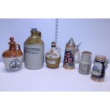A job lot of assorted advertising stoneware bottles etc. Postage unavailable