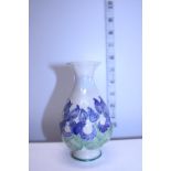A small signed vase by L B Moorcroft made for Moorland Pottery. 13.5cm tall.