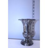 A hallmarked silver vase for Sheffield 1911. 135 grams.