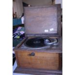 An antique wind up gramophone (Needs attention). Shipping unavailable