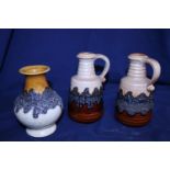A pair and one other West German art pottery vase. 17cm tall.