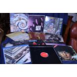 Twelve assorted LP Records including The Beatles, Rolling Stones, Pink Floyd etc.