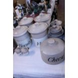 A selection of vintage stoneware containers. Shipping unavailable