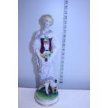 A continental Bisque figurine. 40cm tall.