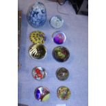 A job lot of assorted paper weights