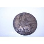 A WW1 bronze penny awarded to Charlie Palmer