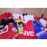 A job lot of assorted football shirts