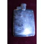 A hallmarked silver hip flask 106 grams