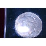 A 1923 American silver peace dollar