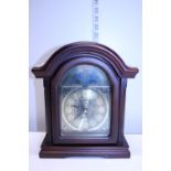 A Bentima battery powered mantel clock