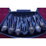 A set of hallmarked silver teaspoons and sugar tongs