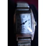 A gentlemen's 9CT gold bodied JW Benson wrist watch in working order GW 47.07 grams
