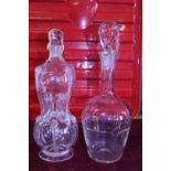 Two antique glass decanters one probably Dutch with signature