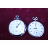 A vintage Smiths pocket watch (not working) and a vintage Omega 15 jewel pocket watch in good