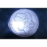 An 1889 American silver dollar